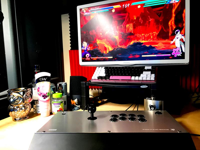 PC setup essentials: Fight stick for those quarter-circles (still rocking that shiny new Hori Fighting Edge), men’s vitamins (do not use if female, you will die), platform o delicately raise monitor and keyboard, owl scented wax burner to set the mood, Olay Silky Berry body lotion to make it hard for opponents to land grabs and flash of “juice” in case of repeated losses.